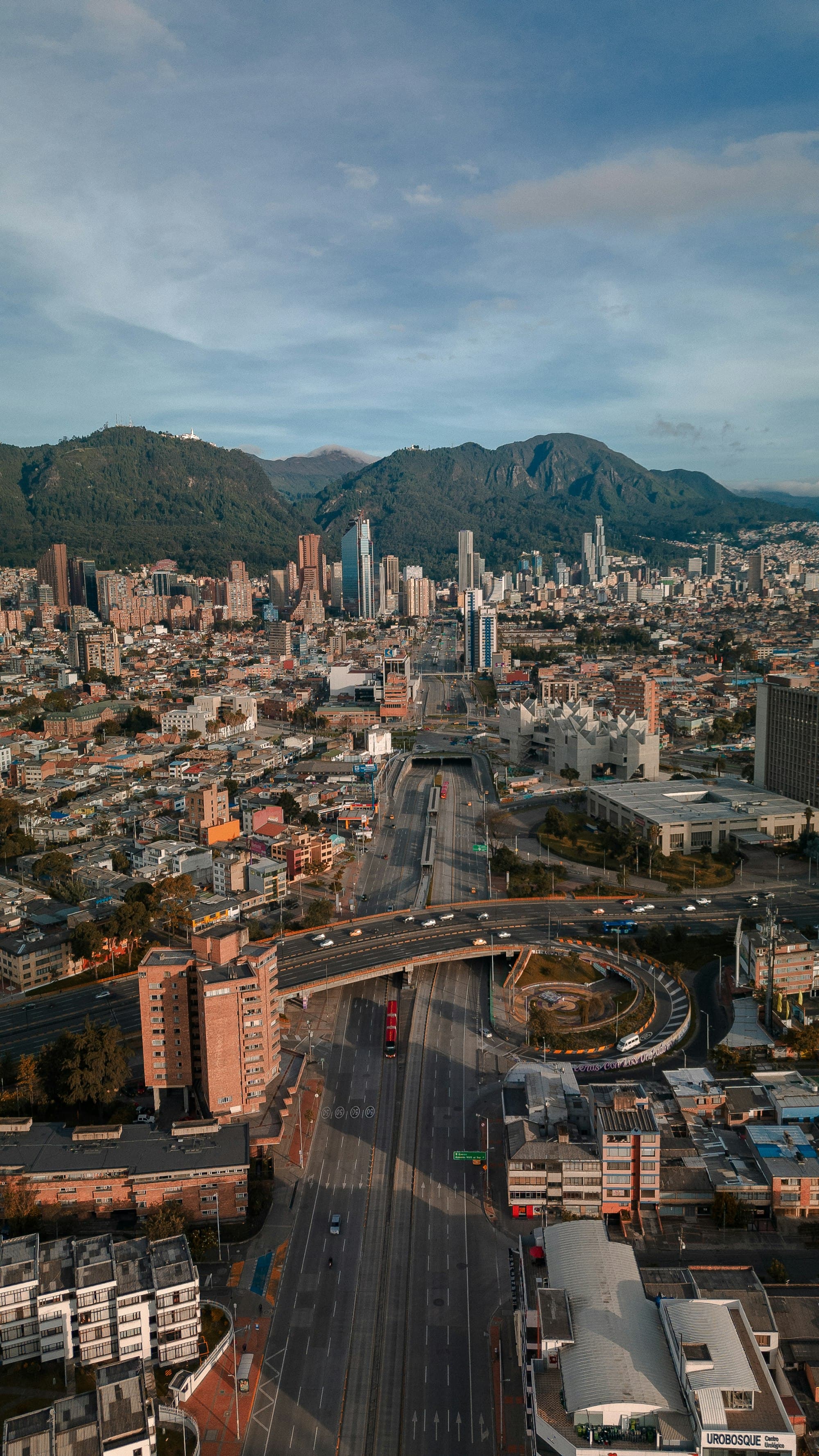 Bogotá from the air, with the mountains behind the city